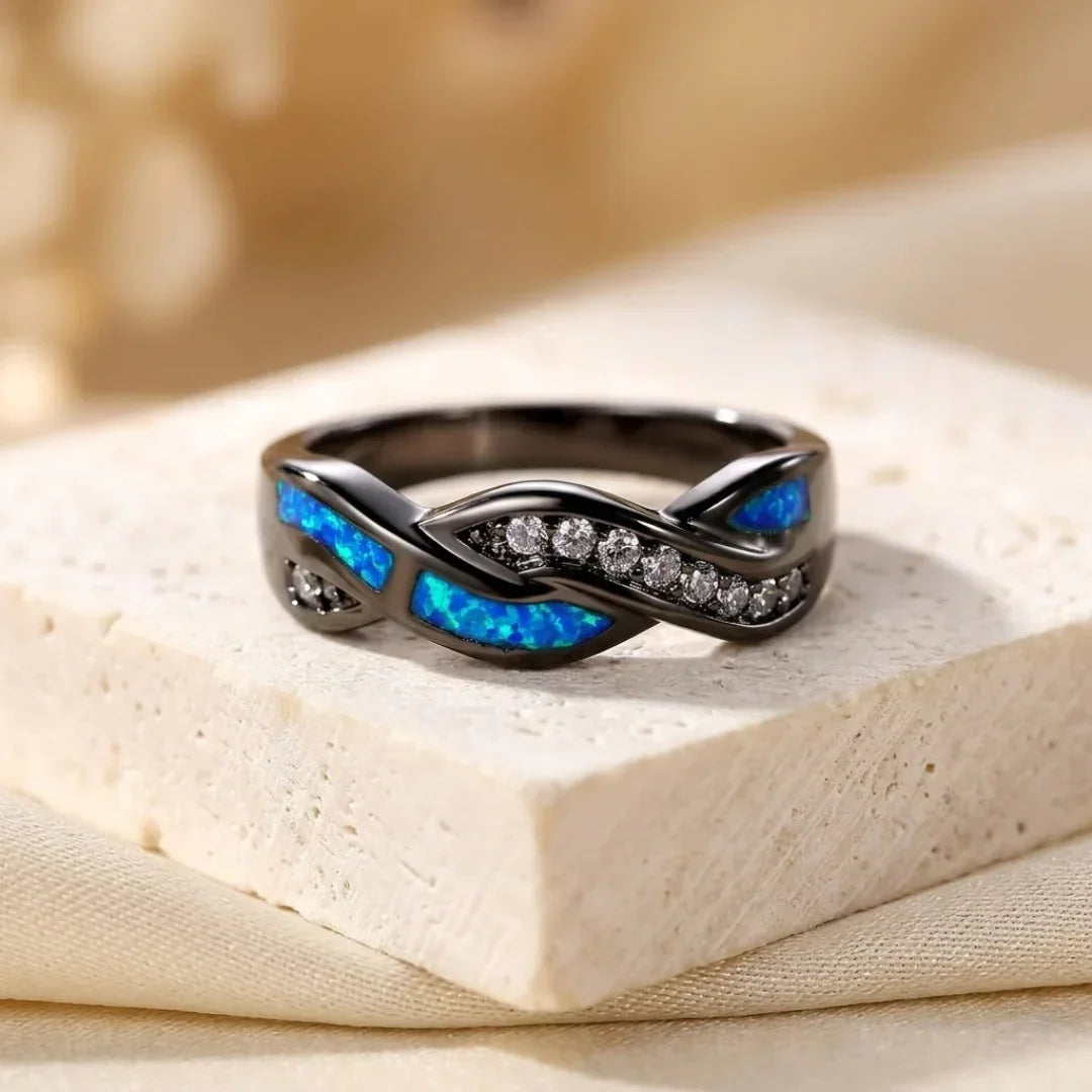 Anello in argento intrecciato con incrustazione
