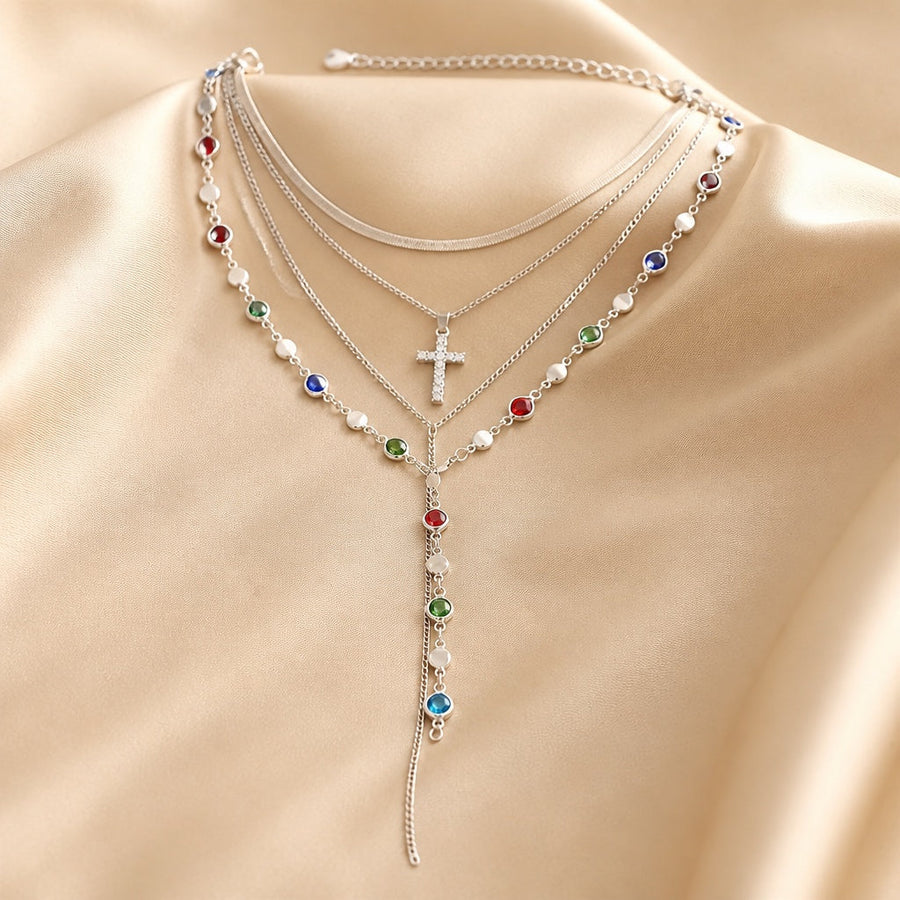 Collana e orecchini in oro bianco con pietre multicolori