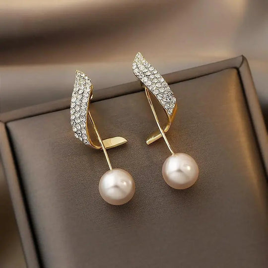 Orecchini in oro con perle