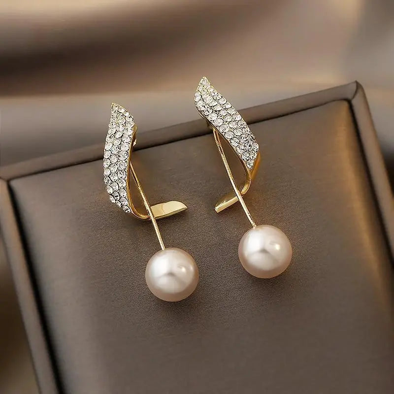 Orecchini in oro con perle