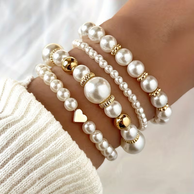 Bracciali in perle bianche