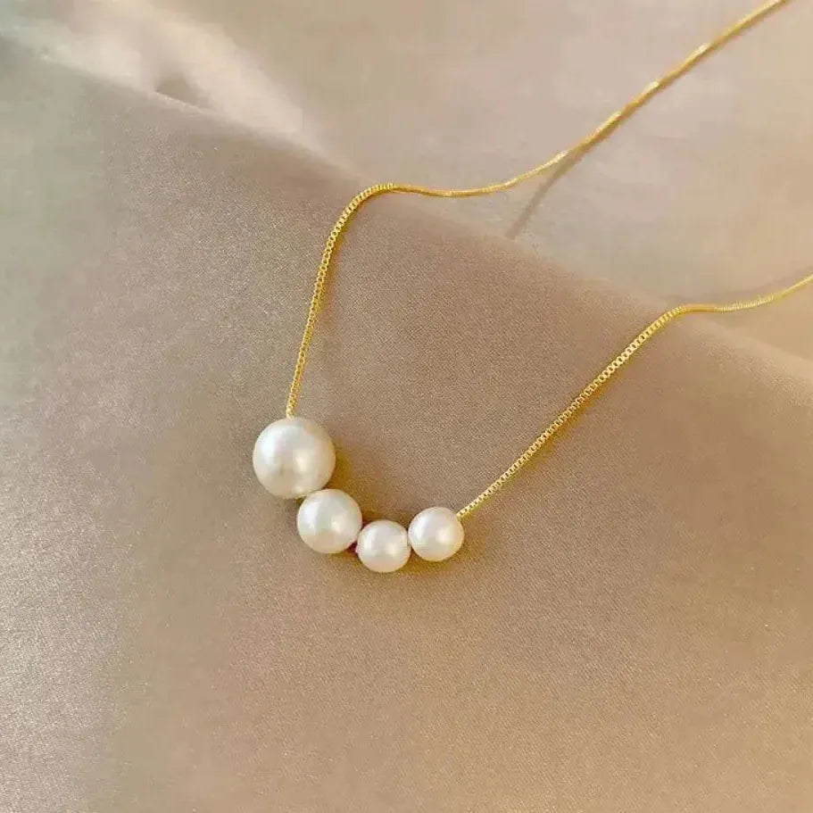 Collana d'oro con belle perle