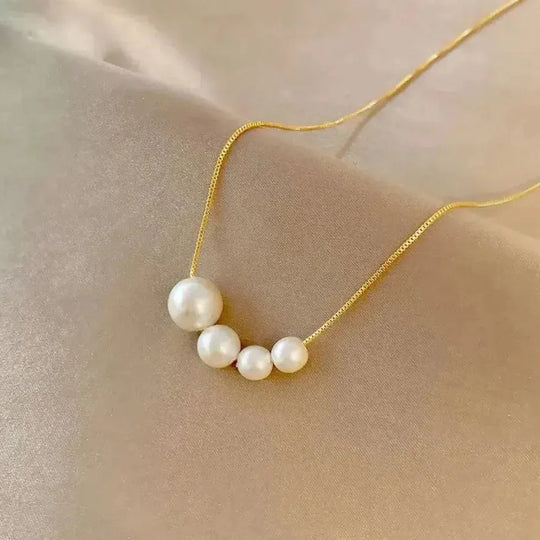 Collana d'oro con belle perle