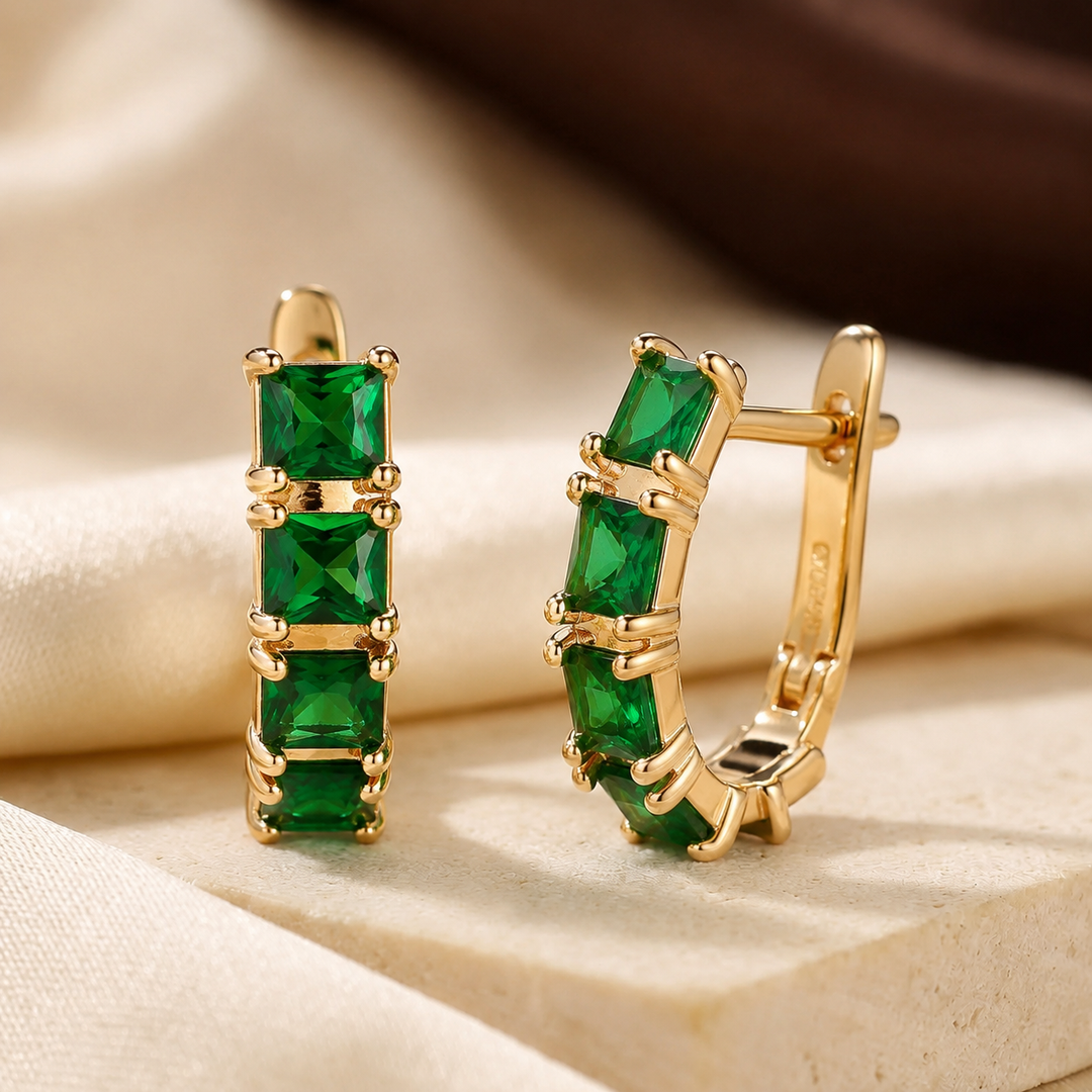 Orecchini a cerchio spessi in oro ed emerald