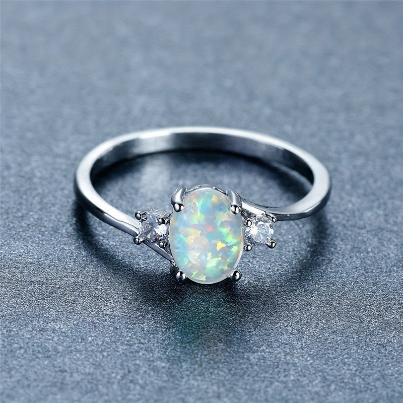 Anello Abbraccio Opale | Oro Bianco