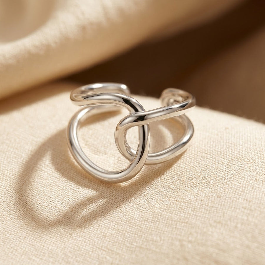 Anello aperto in argento intrecciato